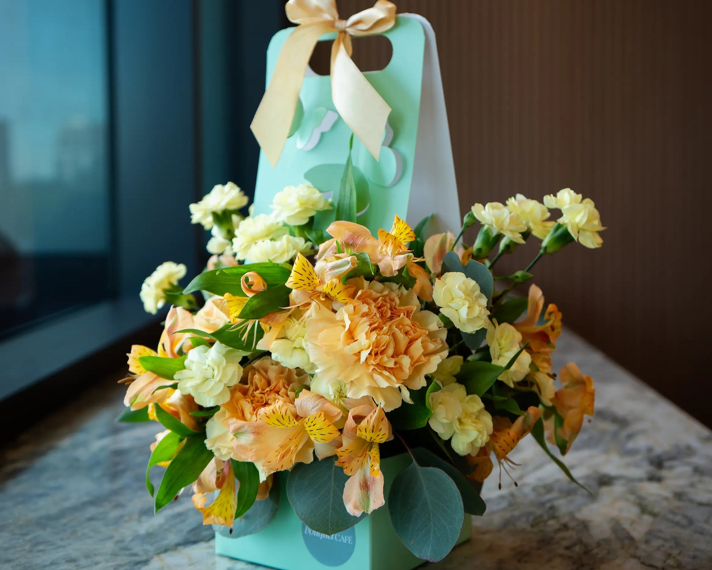 Signature  floral arrangement by Bouquet Café, Vancouver’s flower shop and coffee bar. A limited-edition design combining seasonal blooms and artisanal presentation.