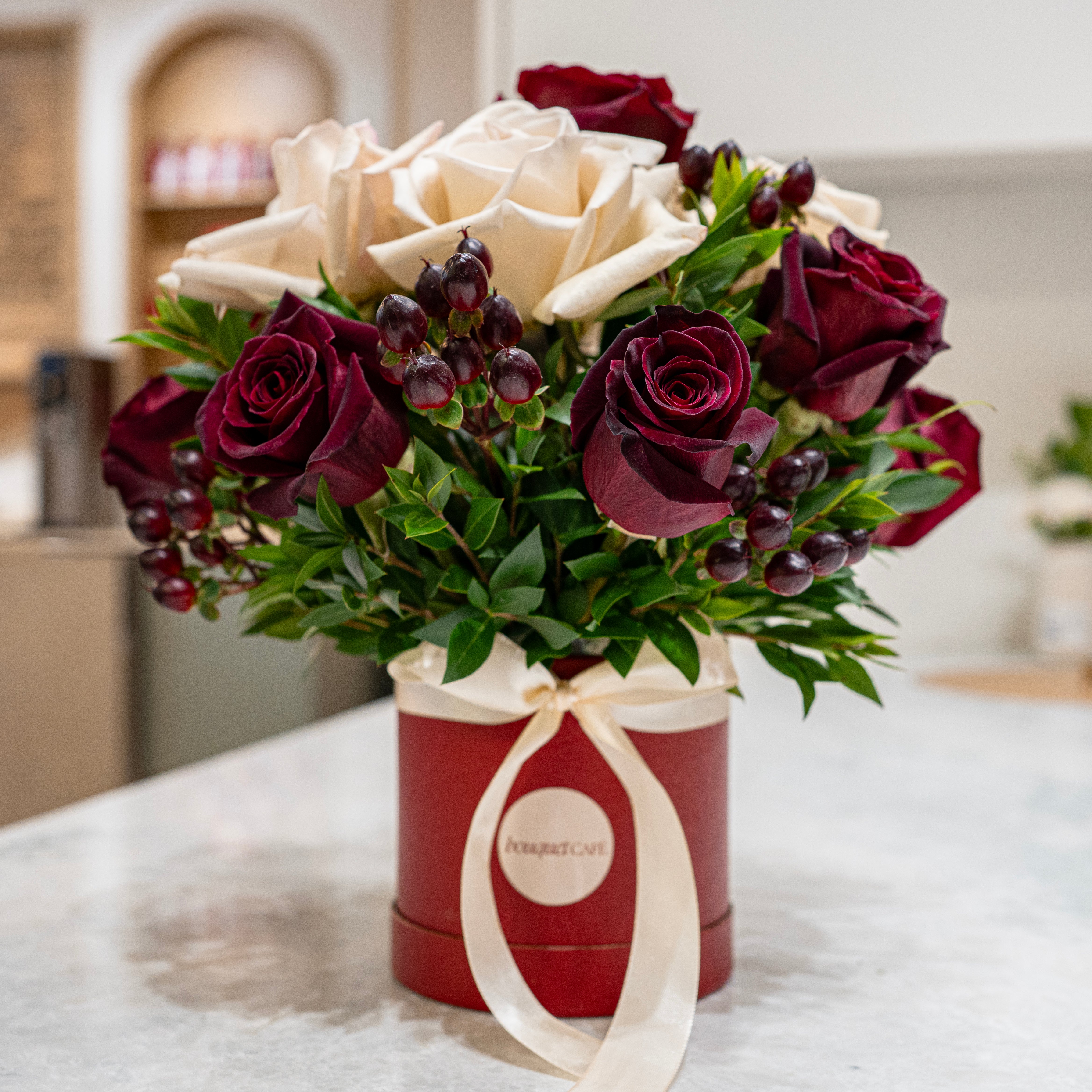 Evening in Coal Harbour is an elegant burgundy and ivory rose hat box from our Valentine’s collection. Designed in Vancouver by Bouquet Café.
