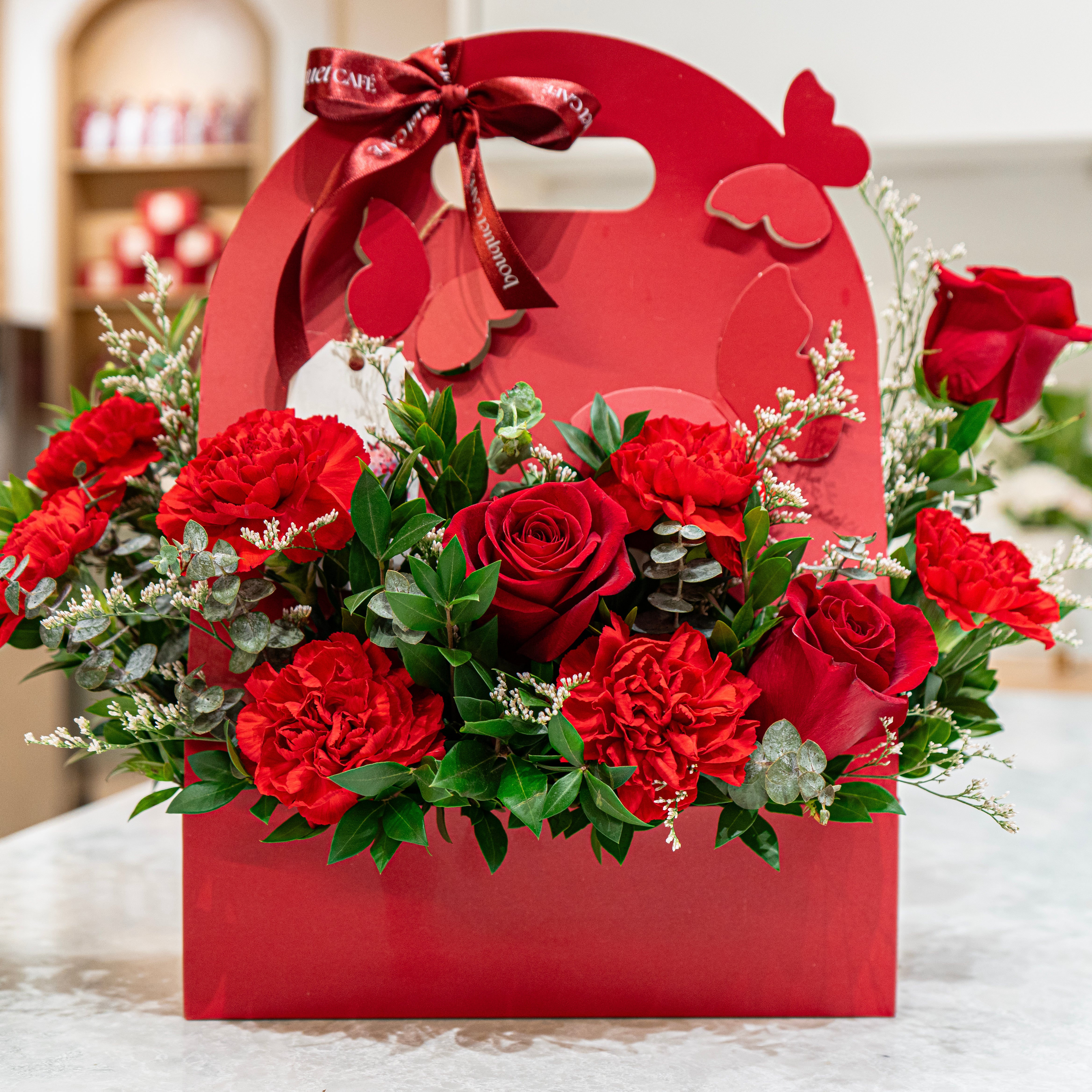 Love, On Main is a bold red rose and carnation butterfly box from our Valentine’s collection. Designed in Vancouver by Bouquet Café for heartfelt moments.