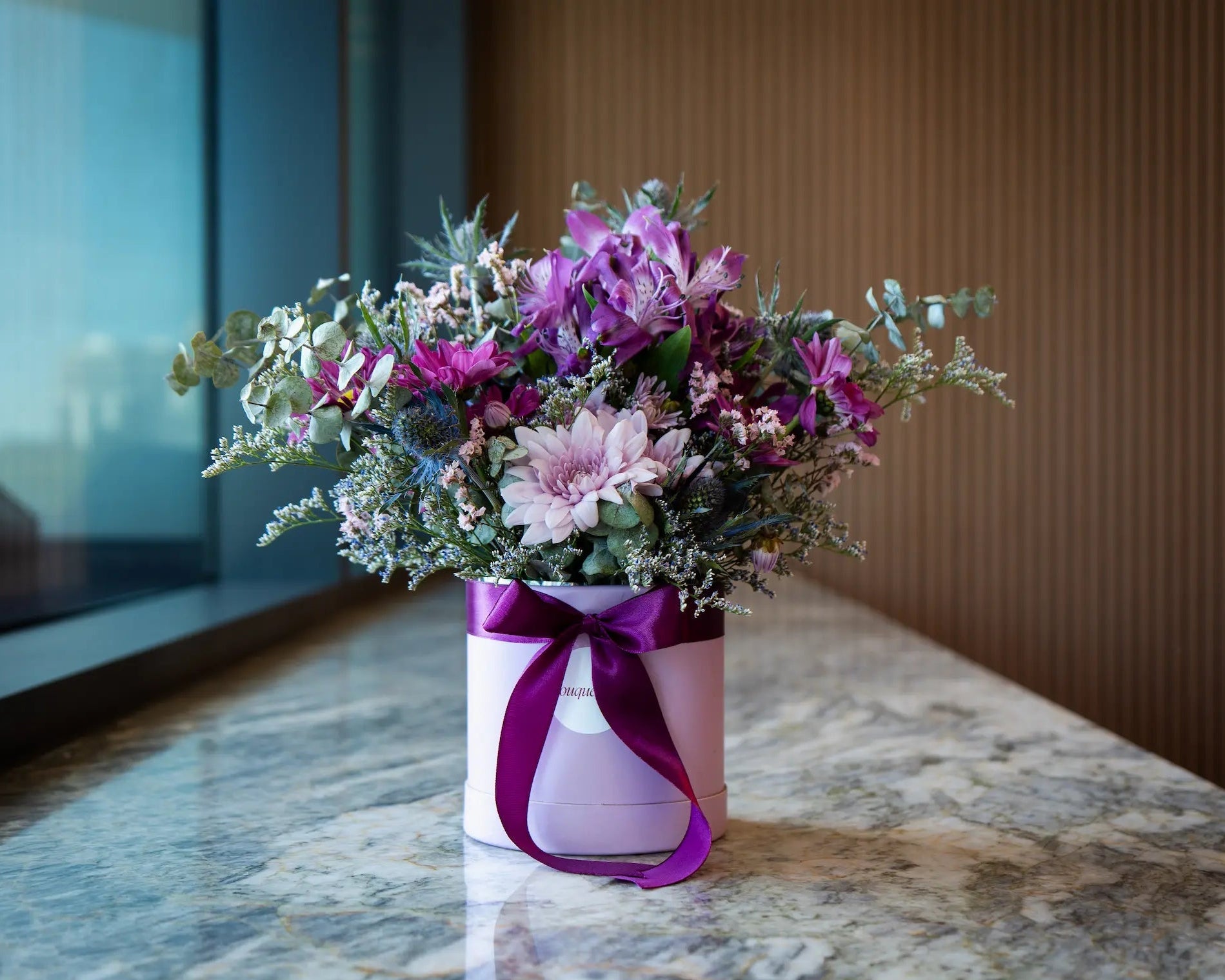 Signature floral arrangements by Bouquet Café, Vancouver’s flower shop and coffee bar. A limited-edition design combining seasonal blooms and artisanal presentation.